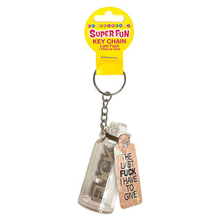 LITTLE GENIE Super Fun Key Chain with humorous phrase "Last F*** I Have To Give" featuring colorful design on a metal key ring.