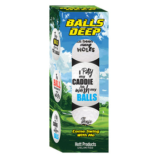 Set of three novelty golf balls with humorous slogans by Hott Products, featuring colorful designs and playful text.