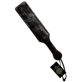 Black leather fetish paddle with fur lining from Sportsheets, featuring a sturdy handle and textured surface for sensory play.